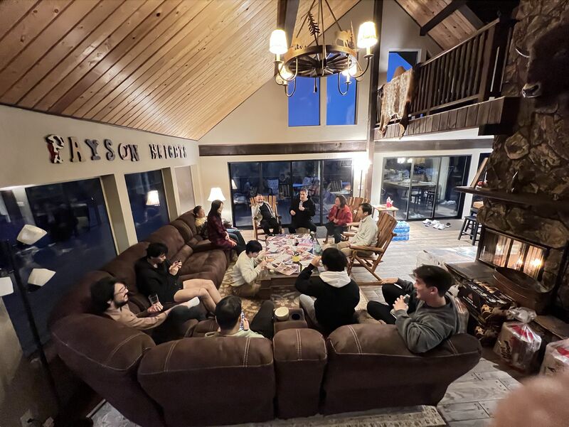 The living room after dinner, the whole house in one circle